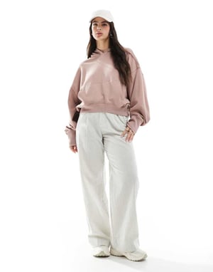 ASOS DESIGN oversized hoodie med hög-låg fåll i tvättad dämpad rosa