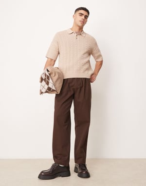 ASOS DESIGN avslappnad passform ribbad stickad polo i sten
