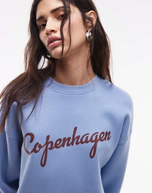 Topshop graphic Copenhagen oversized sweatshirt in blue
