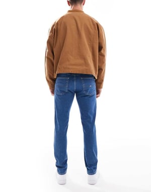 Tommy Jeans Austin slim tapered jeans i mellan tvätt