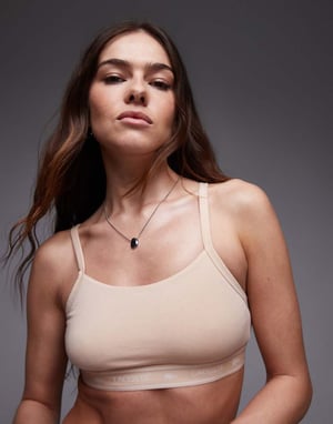 Lacoste co-ord bralette in beige with branded taping