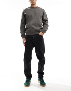Tommy Jeans Isaac relaxed tapered jeans in black