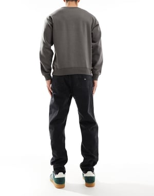 Tommy Jeans Isaac relaxed tapered jeans in black