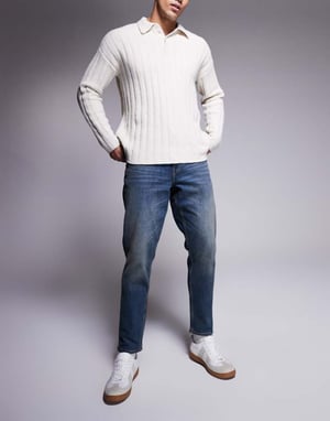 ASOS DESIGN stretch tapered jeans i medtvätt med toning