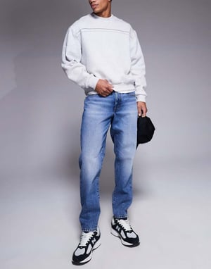 ASOS DESIGN tapered jeans in dark wash blue