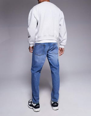 ASOS DESIGN tapered jeans in dark wash blue
