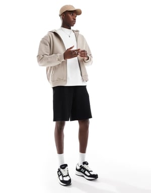ASOS DESIGN oversized shorts in waffle texture in black