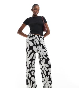 Vero Moda Tall high waist wide leg plisse trouser in monochrome floral print