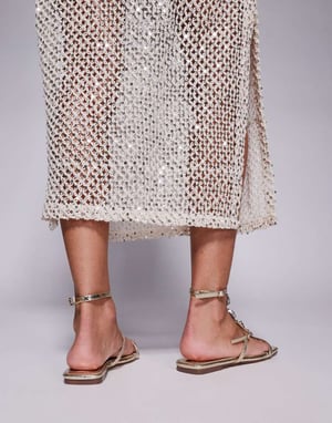 Simmi London Azura utsmyckad remknut detalj flatsandaler i guld