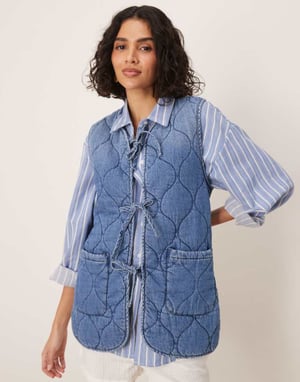ASOS DESIGN denim quilted vest in midwash blue
