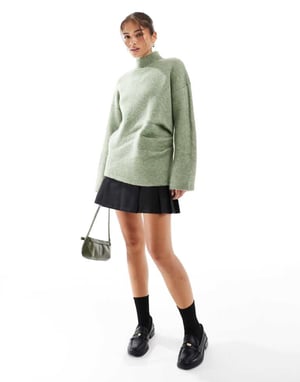 ASOS DESIGN stickad samlad tröja i pistage
