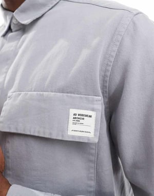 ASOS DESIGN boxy overshirt with badge detail in grey