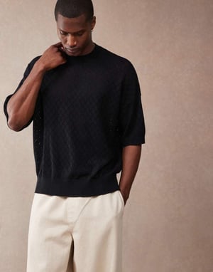 ASOS DESIGN oversize passform punktstickad t-shirt med argylemönster i svart