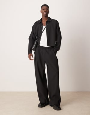 ASOS DESIGN matchande super baggy plisserade byxor med elastisk midja i svart