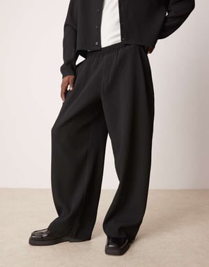 ASOS DESIGN matchande super baggy plisserade byxor med elastisk midja i svart