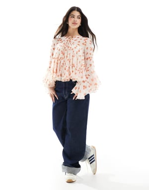 ASOS DESIGN blus med knytband och volangärmar i blommönster med lager på lager