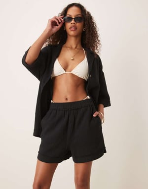 ASOS DESIGN cheesecloth pull on shorts with raw edge detail co-ord in black
