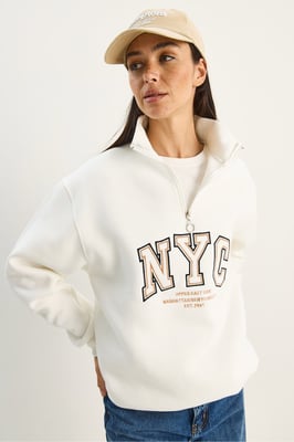 Over-sized Gebreide Sweater met Ritskraag en Borduurwerk