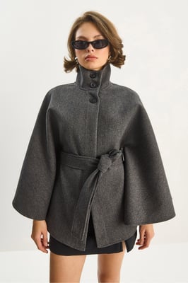 Ponchojacka med knytning