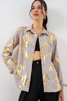 Oversized gestreepte blouse met knopen