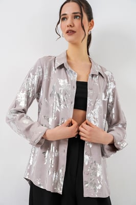 Oversized gestreepte blouse met knopen