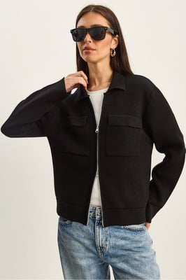 Ribbad stickad cardigan med dragkedja och fickor