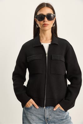 Ribbad stickad cardigan med dragkedja och fickor