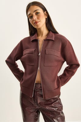 Ribbad stickad cardigan med dragkedja och fickor