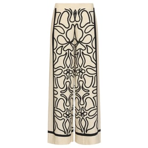 Smashed Lemon Crème wide leg broek met zwart grafisch patroon |
