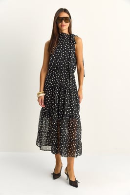 Pruik met halterkraag in polkadots midi jurk