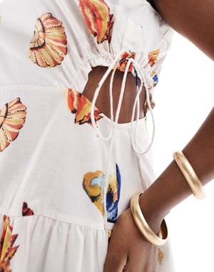 ASOS DESIGN Curve ärmlös midiklänning med utskärningar i heltryckt snäckmönster