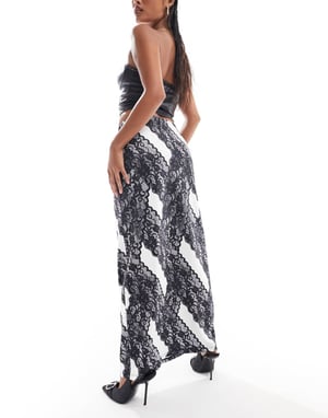 Vero Moda Petite spetsmönstrad jersey maxikjol i mono
