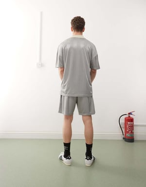 Umbro football shorts in silver