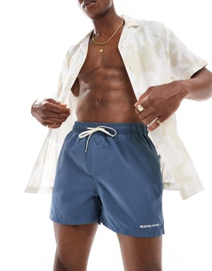 Utvalda badshorts i blått