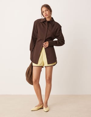 ASOS DESIGN cinch shoulder pad shirt with tie back in chocolate