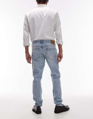 Calvin Klein Jeans slim tapered jeans in light wash