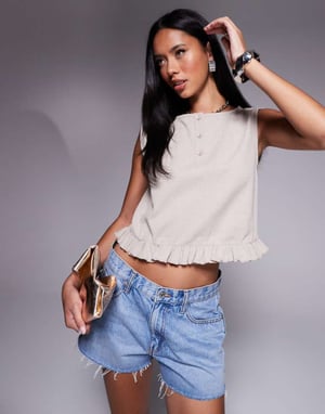 ASOS DESIGN sleeveless waffle button through top in mini frill hem in cream