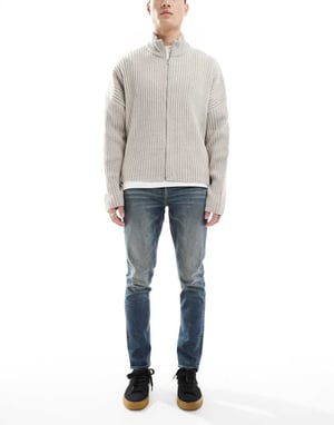 ASOS DESIGN skinny jeans med grön nyans i ljus tvättad blå
