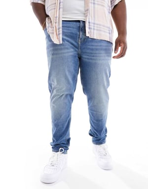 ASOS DESIGN smala jeans med ton i ljustvättad blå