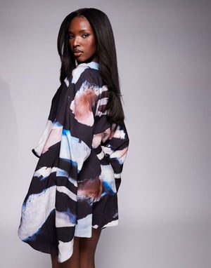 ASOS DESIGN batwing overlay playsuit in abstract print