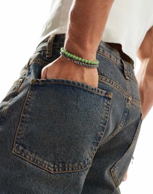 ASOS DESIGN tapered fit jeans i blåtvätt med nyans