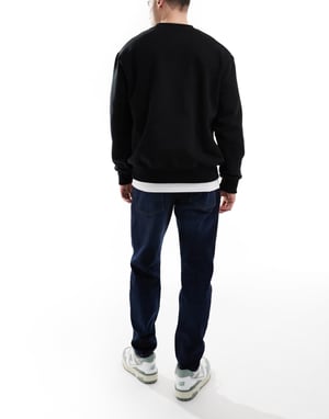 ASOS DESIGN stretch tapered jeans i mörk tvätt
