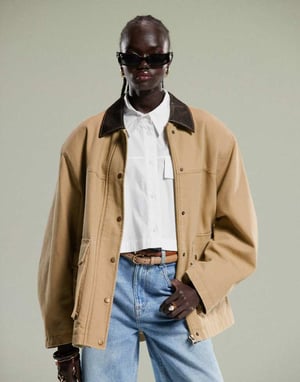 ASOS DESIGN oversized washed jacket with leather look collar in stone