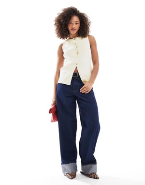 ASOS DESIGN knitted crew neck structured waistcoat with gold buttons in cream