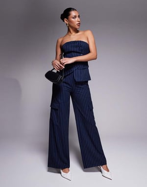 In The Style x Natalya Wright exclusive tailored bandeau asymmetric waistcoat co-ord in navy pinstripe