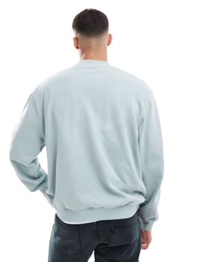 ASOS DESIGN sweatshirt med texttryck i tvättad blå