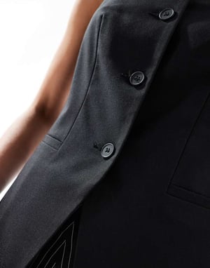 ASOS DESIGN Lång höghalst väst i svart