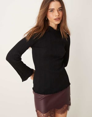 Gina Tricot long sleeve ribbed knit top with fluted funnel neck and cuffs in black