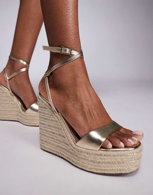ASOS DESIGN Tamika espadrille wedges in gold