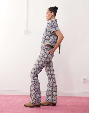 Wrangler co-ord bootcut 70s print jeans in blue